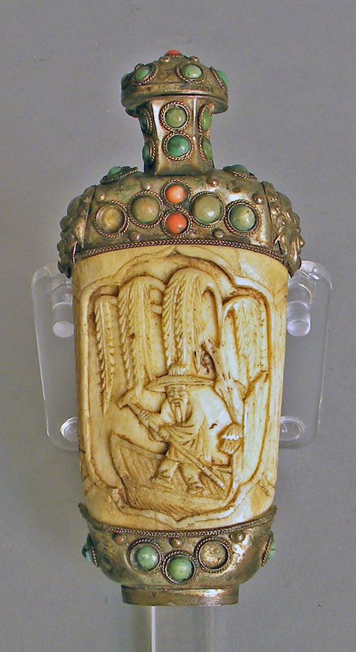 Appraisal: Carved Chinese ivory snuff bottle th c with jeweled mounts