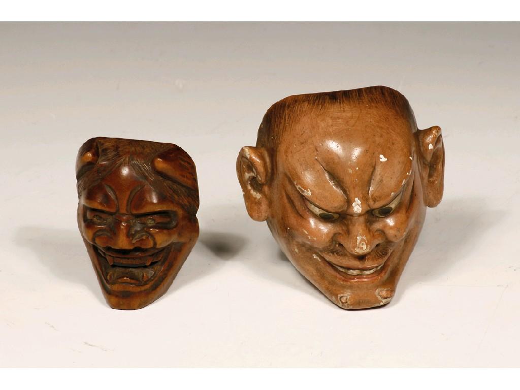 Appraisal: TWO JAPANESE CARVED WOOD FACE MASKS one of a man