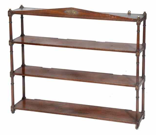 Appraisal: A REGENCY MAHOGANY THREE TIER WALL SHELF with architectural cornice