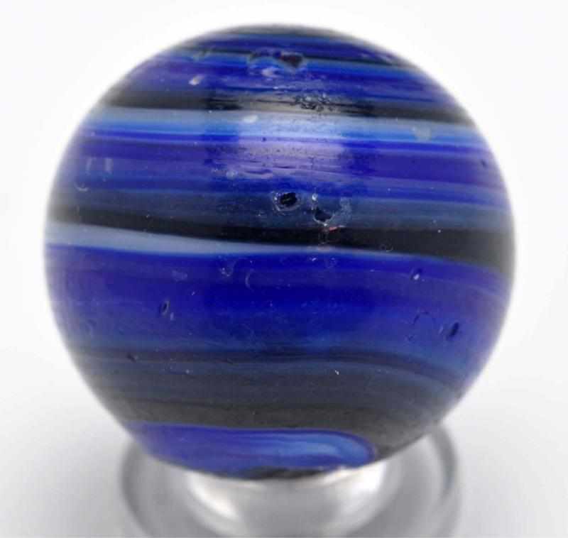 Appraisal: Rare Blue Navarre Horizontal Swirl Marble Description Single melted pontil