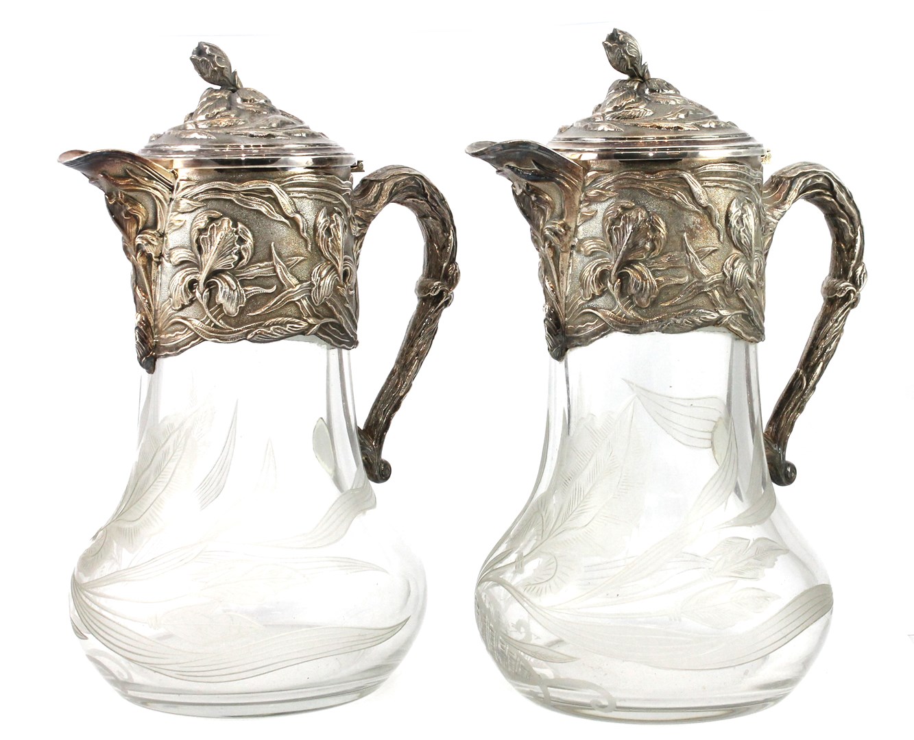 Appraisal: A pair of silver plated metal mounted hinge lidded glass