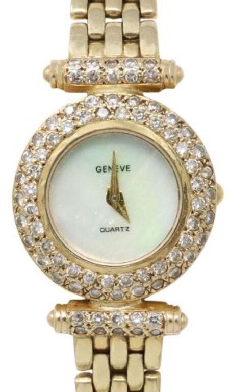 Appraisal: Lady's kt yellow gold wristwatch Geneve diamond-set bezel mother-of-pearl dial