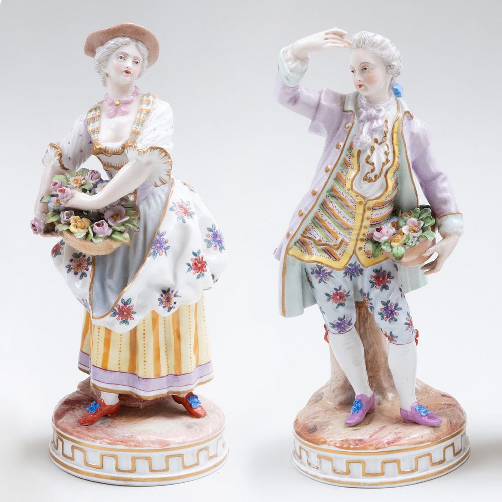 Appraisal: Pair of German Porcelain Figures of a Gardener and Companion