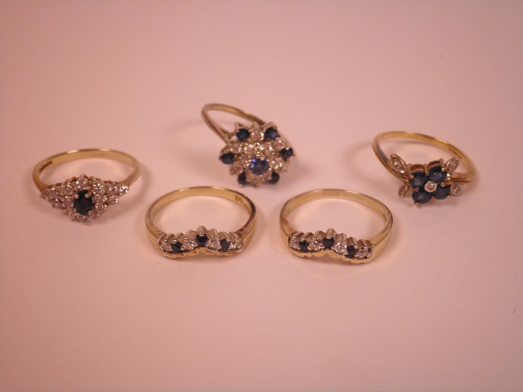 Appraisal: Five amethyst and white stone set dress rings