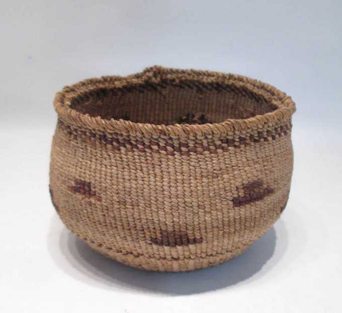 Appraisal: NATIVE AMERICAN KALAMATH WOVEN BASKET with repeating geometric design Height