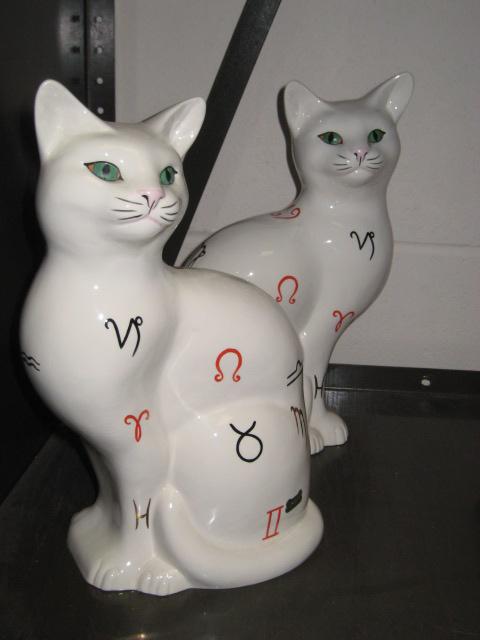 Appraisal: Pair of Beswick Cats painted Greek symbols with green eyes