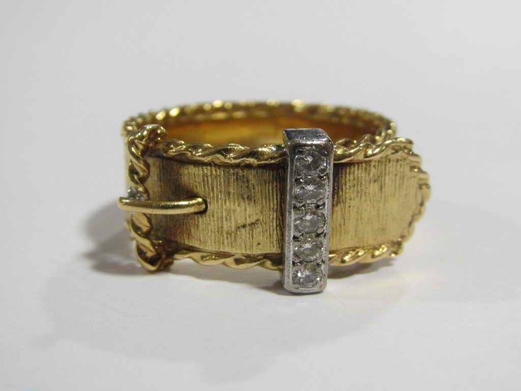 Appraisal: Eighteen carat gold diamond set buckle ring