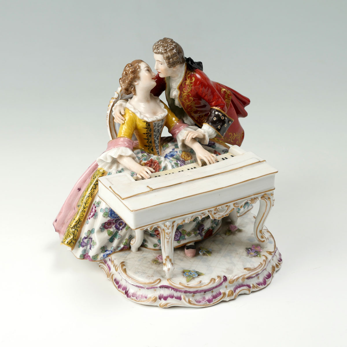 Appraisal: VIENNA PORCELAIN GROUP FLIRTATIOUS PIANO PLAYER Vienna porcelain grouping of