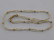 Appraisal: A seed pearl necklace with yellow metal tests carat gold