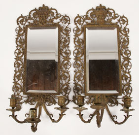 Appraisal: Pair cast brass three arm candle sconces beveled mirrors mythical