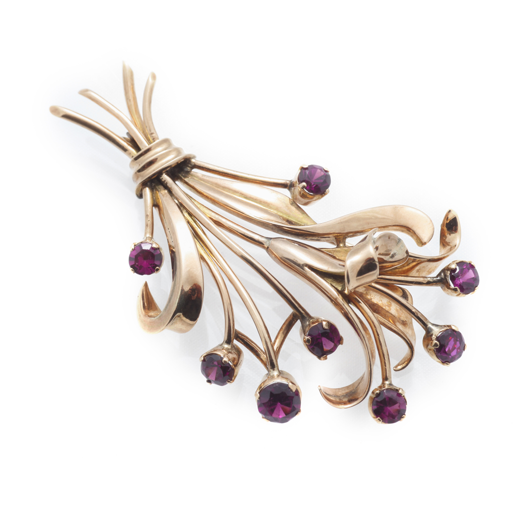 Appraisal: An amethyst set brooch modelled as a floral spray and