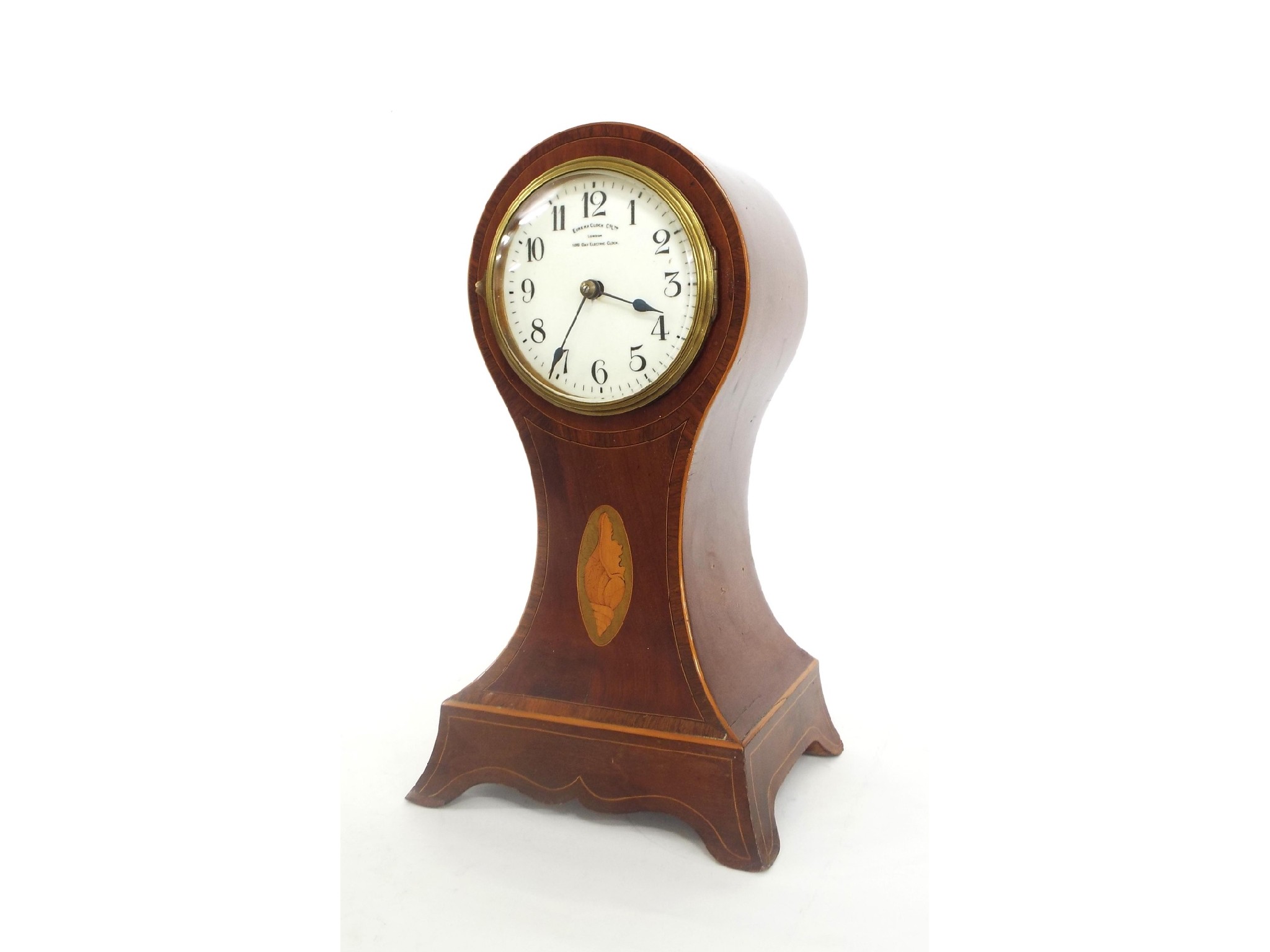 Appraisal: Eureka mahogany battery powered mantel clock the white dial inscribed