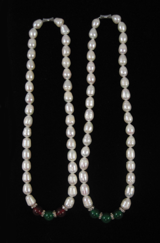 Appraisal: TWO PRINCESS LENGTH PEARL NECKLACES including a - inch necklace