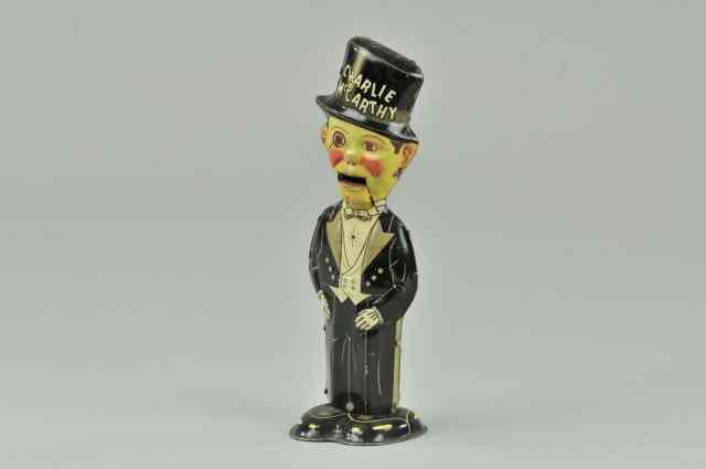 Appraisal: CHARLIE MCCARTHY WALKER Louis Marx lithographed tin clockwork activated motions