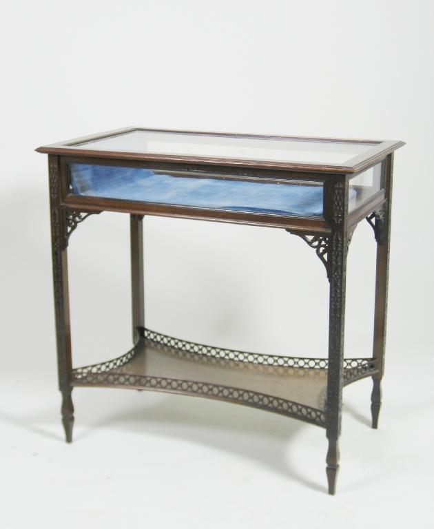 Appraisal: A th Century Bijouterie Table having glazed hinged top on