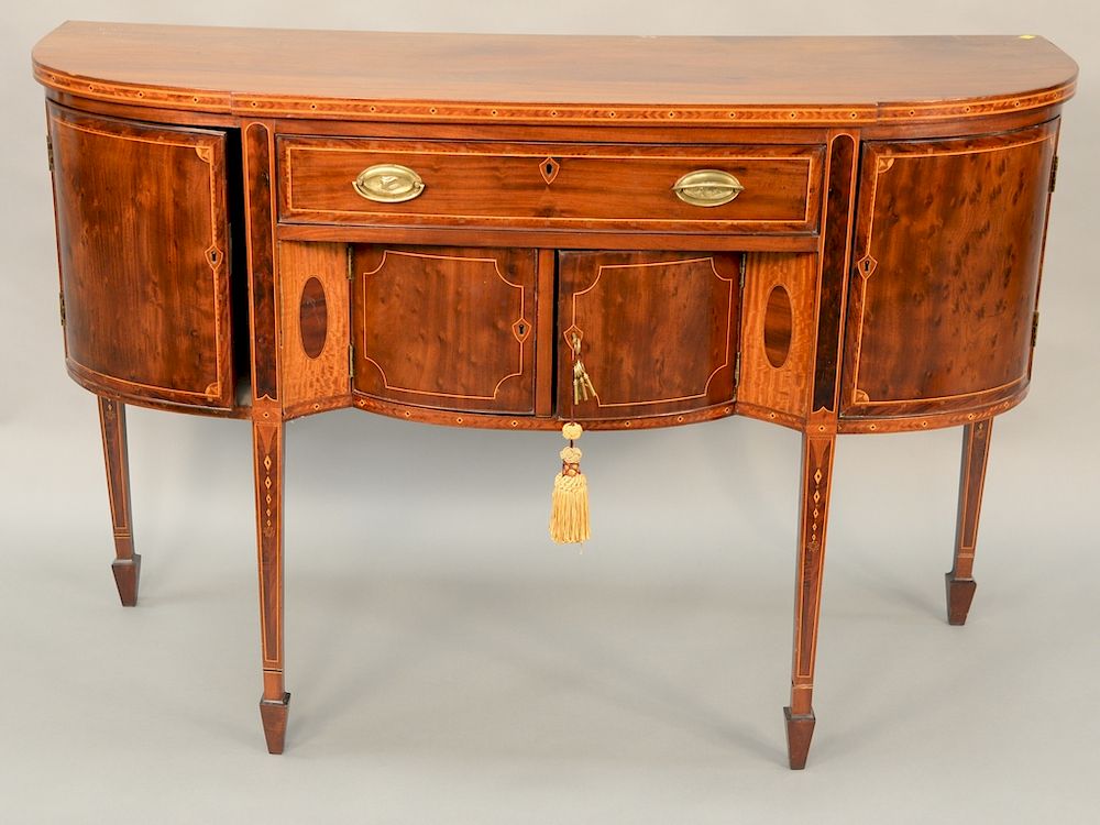 Appraisal: George III style mahogany sideboard having D form top over