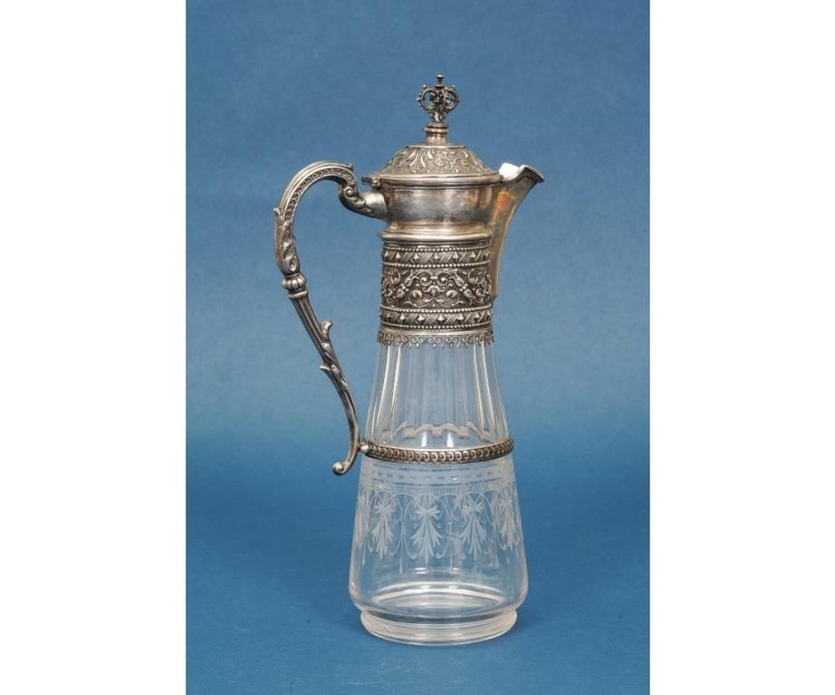 Appraisal: Ornate silver and etched glass claret jug hallmarked with crown