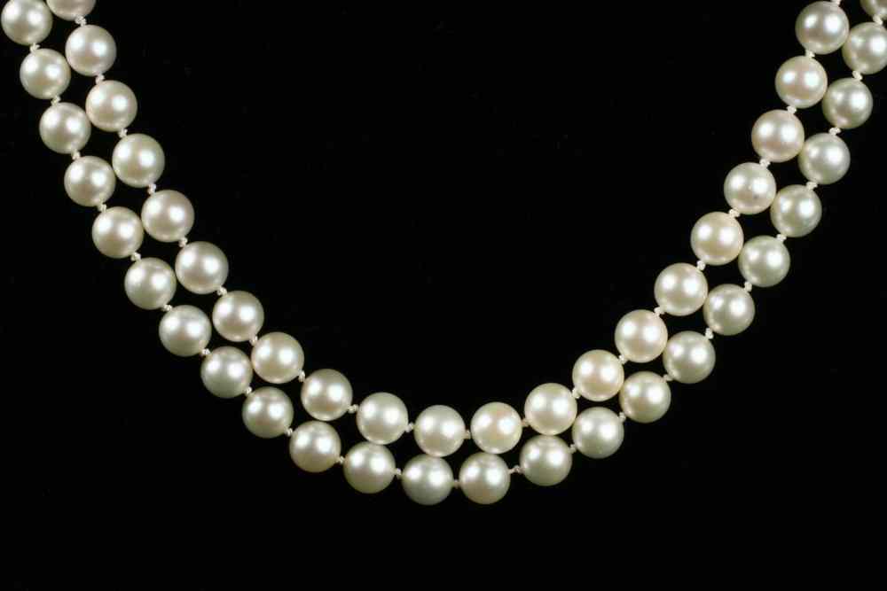 Appraisal: NECKLACE - Double strand of approx ivory colored to mm