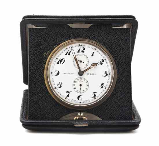 Appraisal: A Swiss Travel Alarm Clock retailed by Tiffany Co the