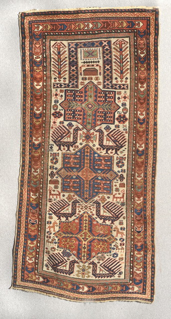 Appraisal: A CAUCASIAN AKSTAFA PRAYER RUG with three central polychrome medallions