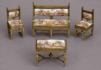 Appraisal: FOUR-PIECE SUITE OF AUSTRIAN ENAMEL AND GILT-METAL MINIATURE FURNITURE Comprising