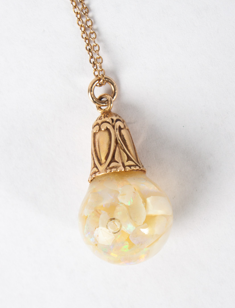 Appraisal: Lady's K gold floating opal pendant necklace rolo link chain