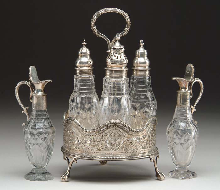 Appraisal: TH CENTURY STERLING CUT GLASS CRUET SET The castor carrying