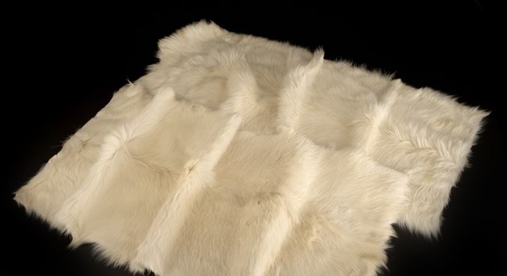 Appraisal: Pair of White Goat Skin Rugs each ' x '