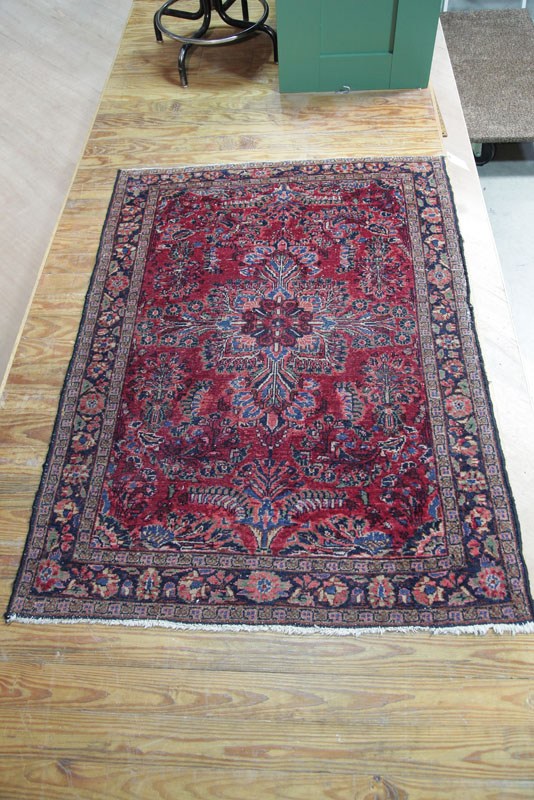 Appraisal: ORIENTAL AREA RUG Maroon field with triple border and central