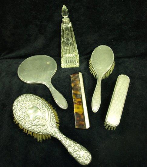 Appraisal: A silver backed four piece dressing set a silver mounted