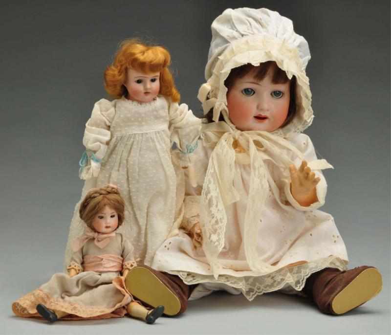 Appraisal: Lot of German Bisque Dolls Description All with bisque heads