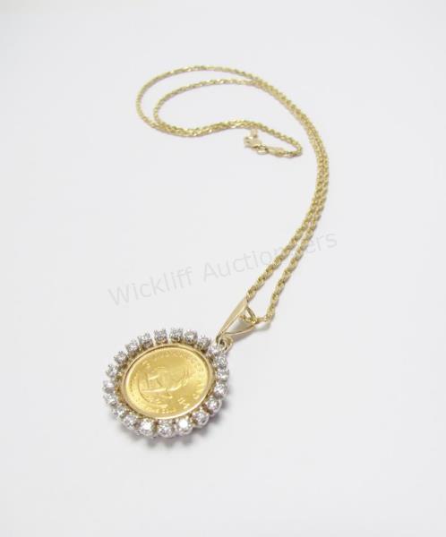 Appraisal: A K yellow gold rope chain with a ounce Krugerrand