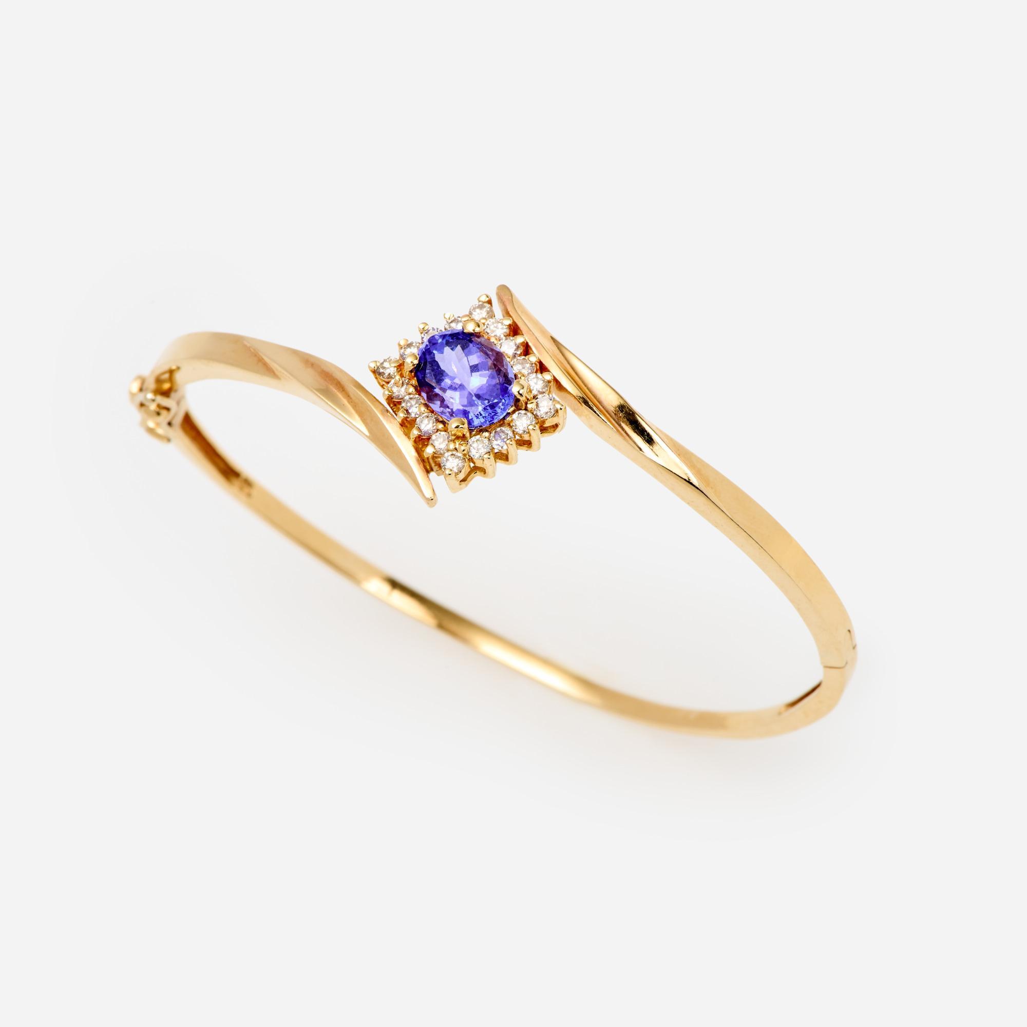 Appraisal: TANZANITE DIAMOND BYPASS HINGED BRACELET IN K A k yellow