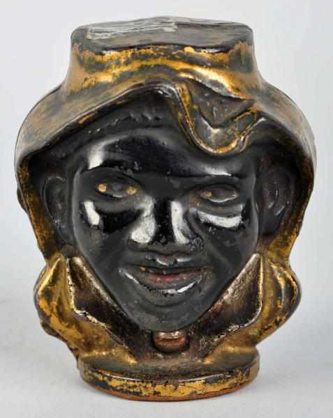 Appraisal: Cast Iron -Faced Black Boy Still Bank Manufactured by A