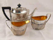 Appraisal: A late Victorian silver three piece bachelor teaset the bodies