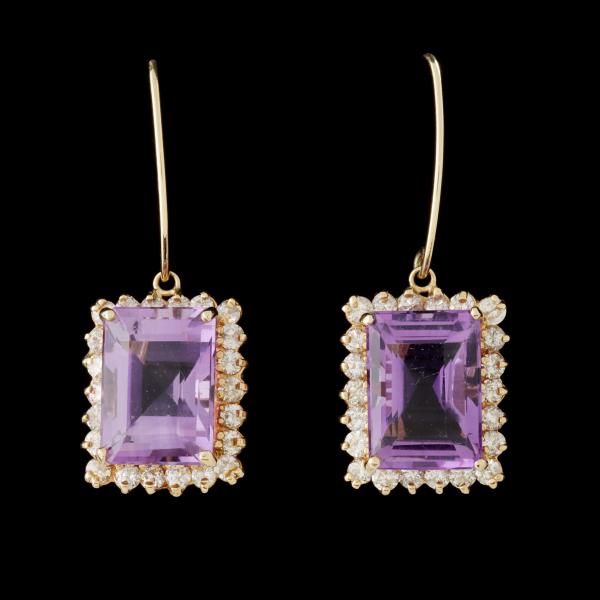 Appraisal: A PAIR AMETHYST AND DIAMOND K GOLD EARRINGSThe pair with