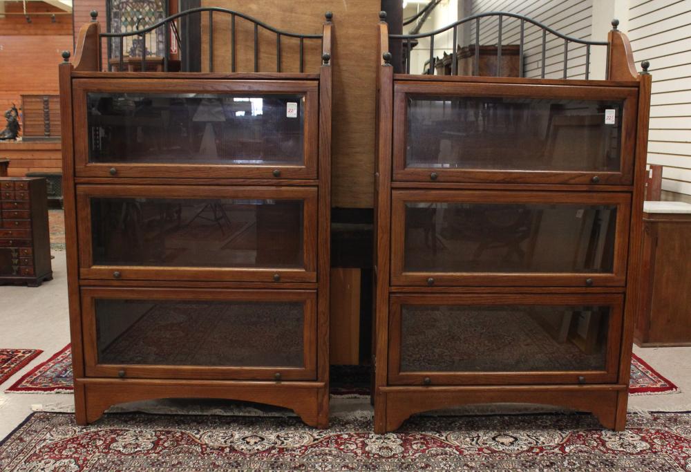 Appraisal: A MODERN PAIR OF 'STACKING' OAK BOOKCASES each divided into