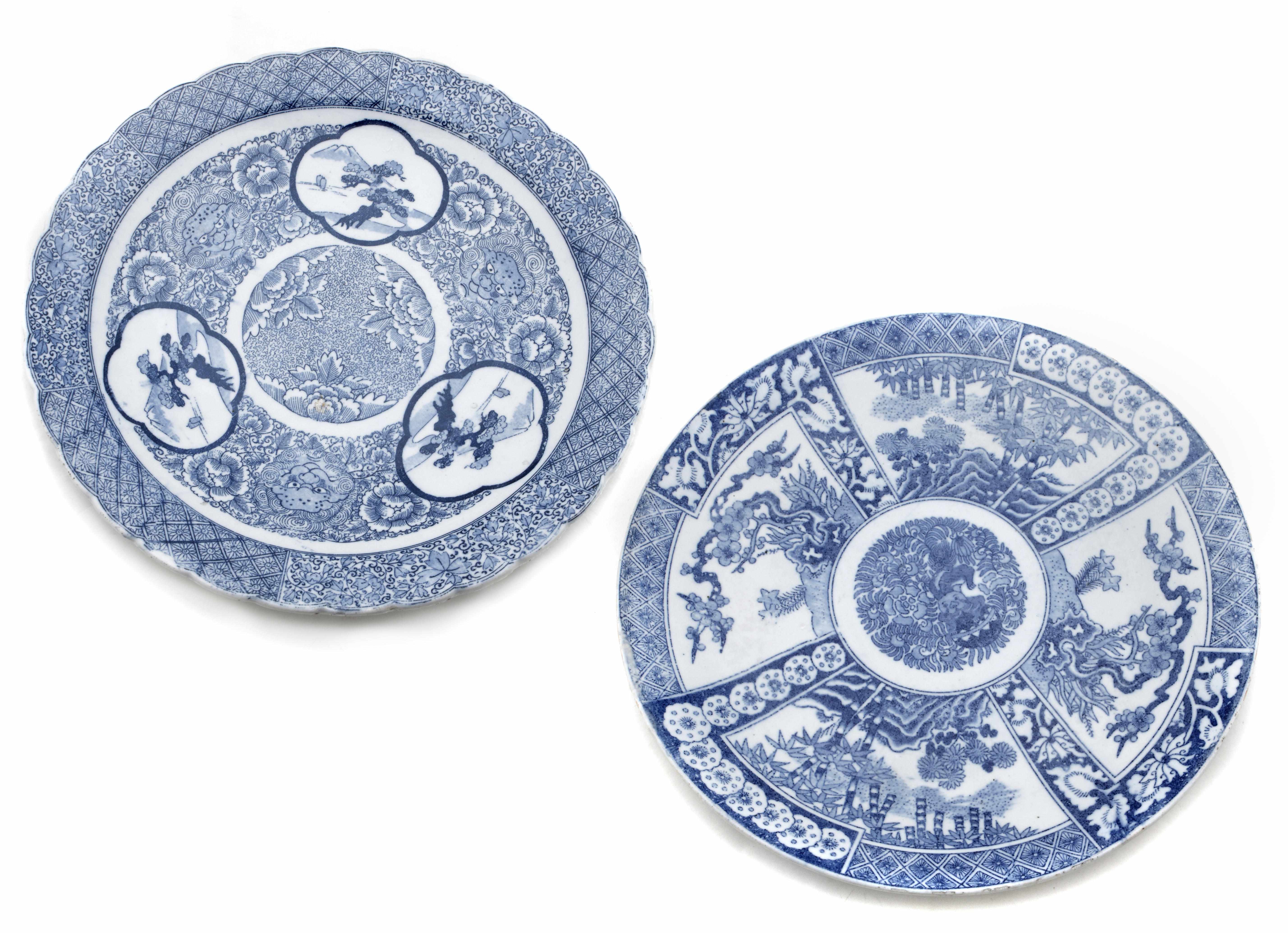 Appraisal: Two Japanese transfer printed blue and white porcelain chargers One