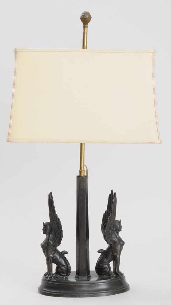 Appraisal: EGYPTIAN REVIVAL BRONZE LAMP The faceted column flanked by a