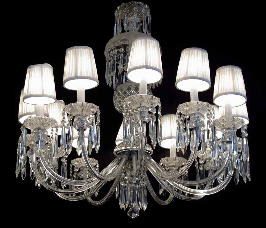 Appraisal: LIGHT CRYSTAL CHANDELIER Each with a shade Bent arms faceted