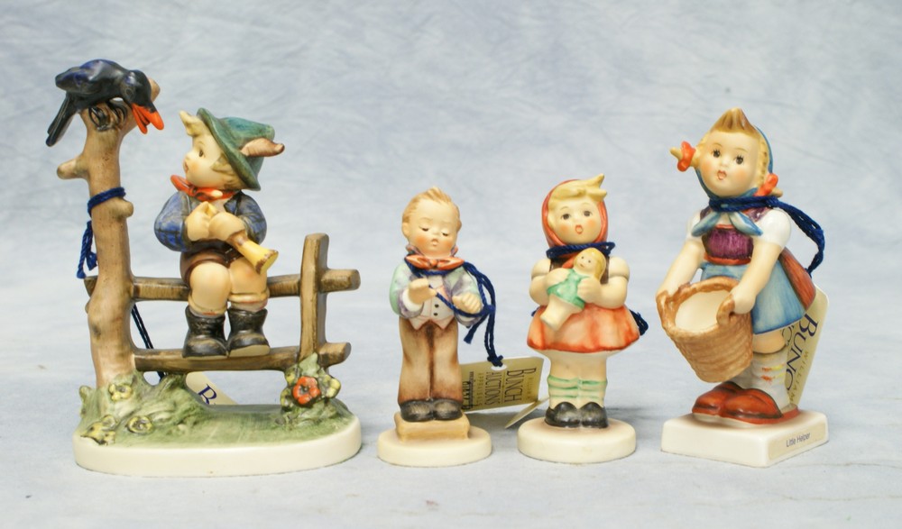 Appraisal: Goebel Hummel figurines Little Helper Hum Mischief Maker Hum Girl