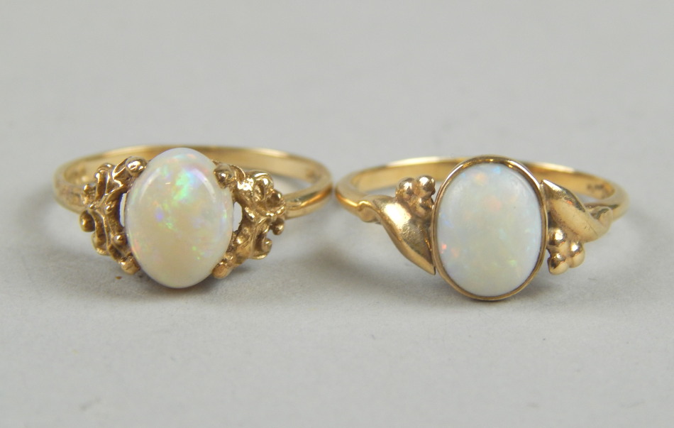 Appraisal: Two ct gold dress rings each set with opal