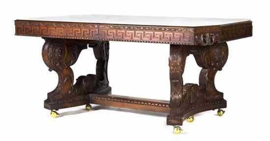 Appraisal: An American Carved Extension Dining Table having an elongated octagonal