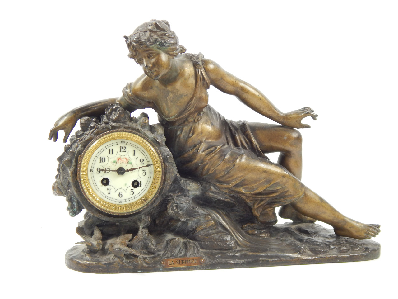 Appraisal: An early thC Continental reclining spelter figural mantel clock the