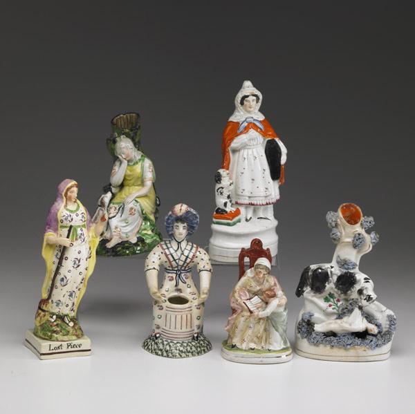 Appraisal: STAFFORDSHIRE Six figurines include Rescue Dog Lost Piece and four