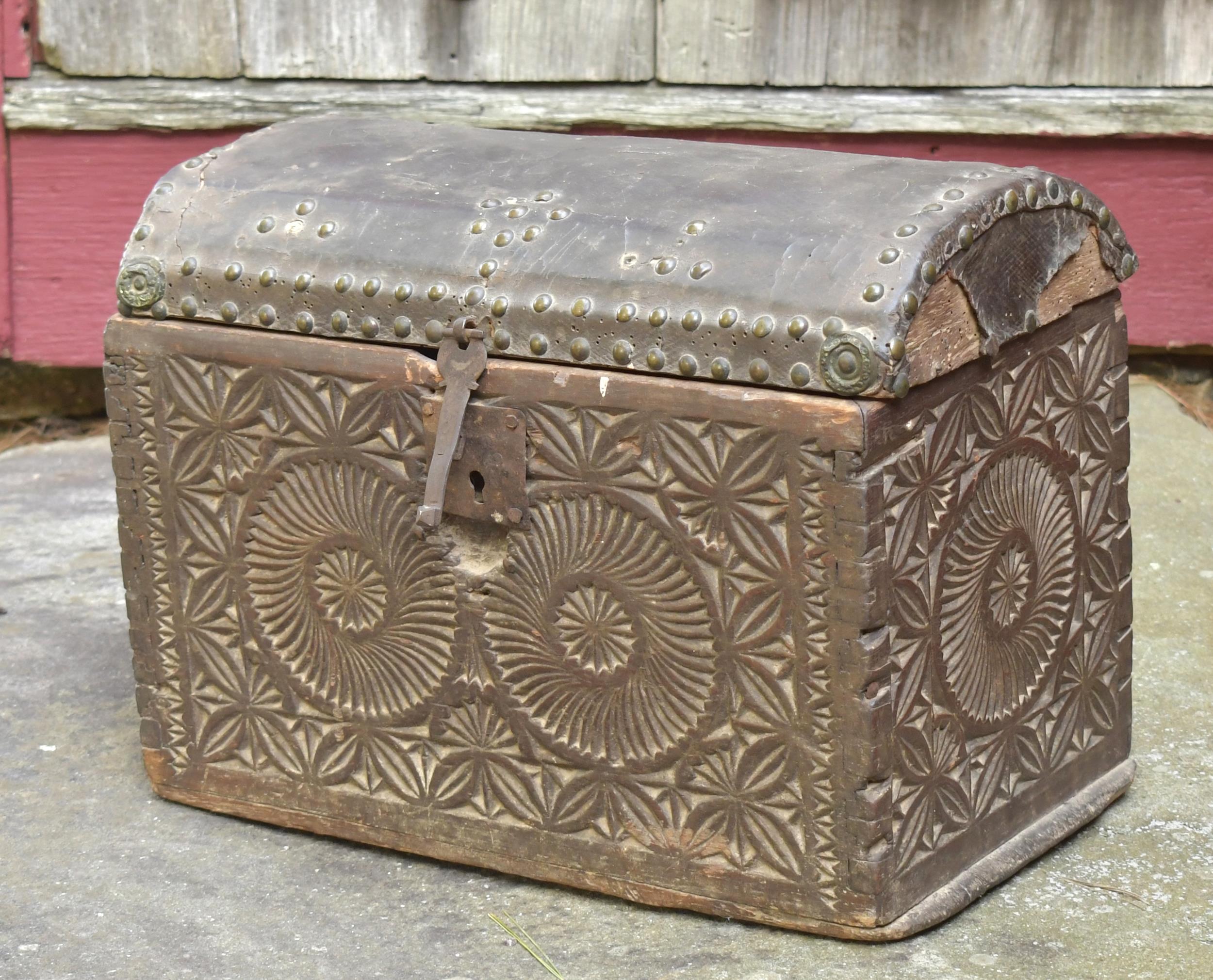 Appraisal: TH C LEATHER AND WOOD CARVED DOMED BOX A dovetailed