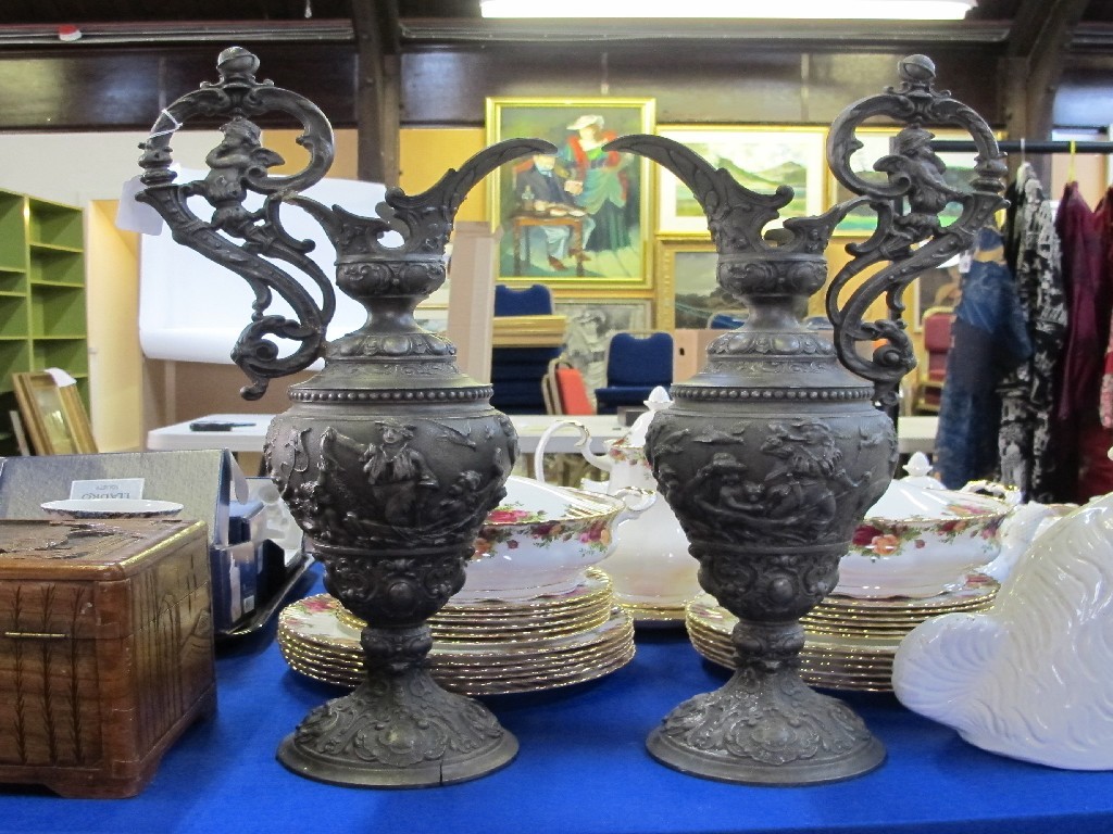 Appraisal: Pair of continental cast metal ewers