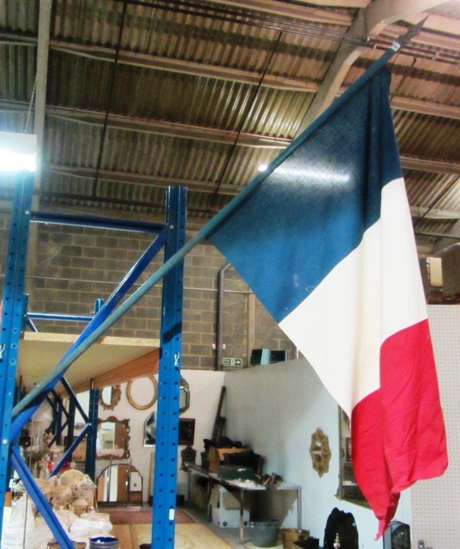 Appraisal: A French flag on a pole