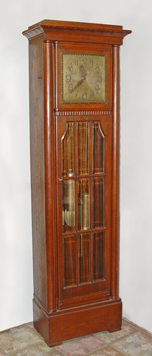 Appraisal: GERMAN WERKSTATTE GRANDFATHER CLOCK Oak tall case with overhanging crest