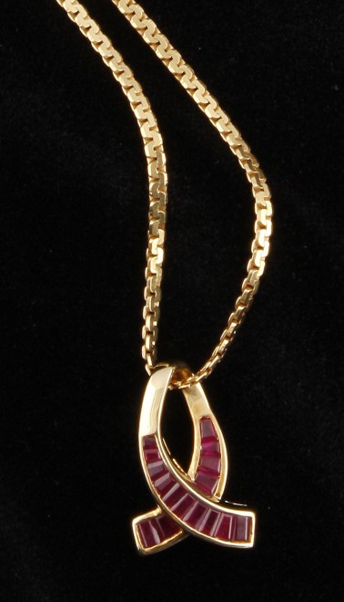 Appraisal: long flat K chain K and ruby slide baguette cut